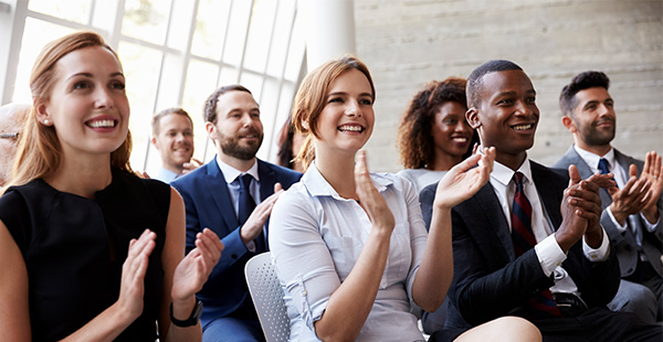 group of diverse people hand clapping